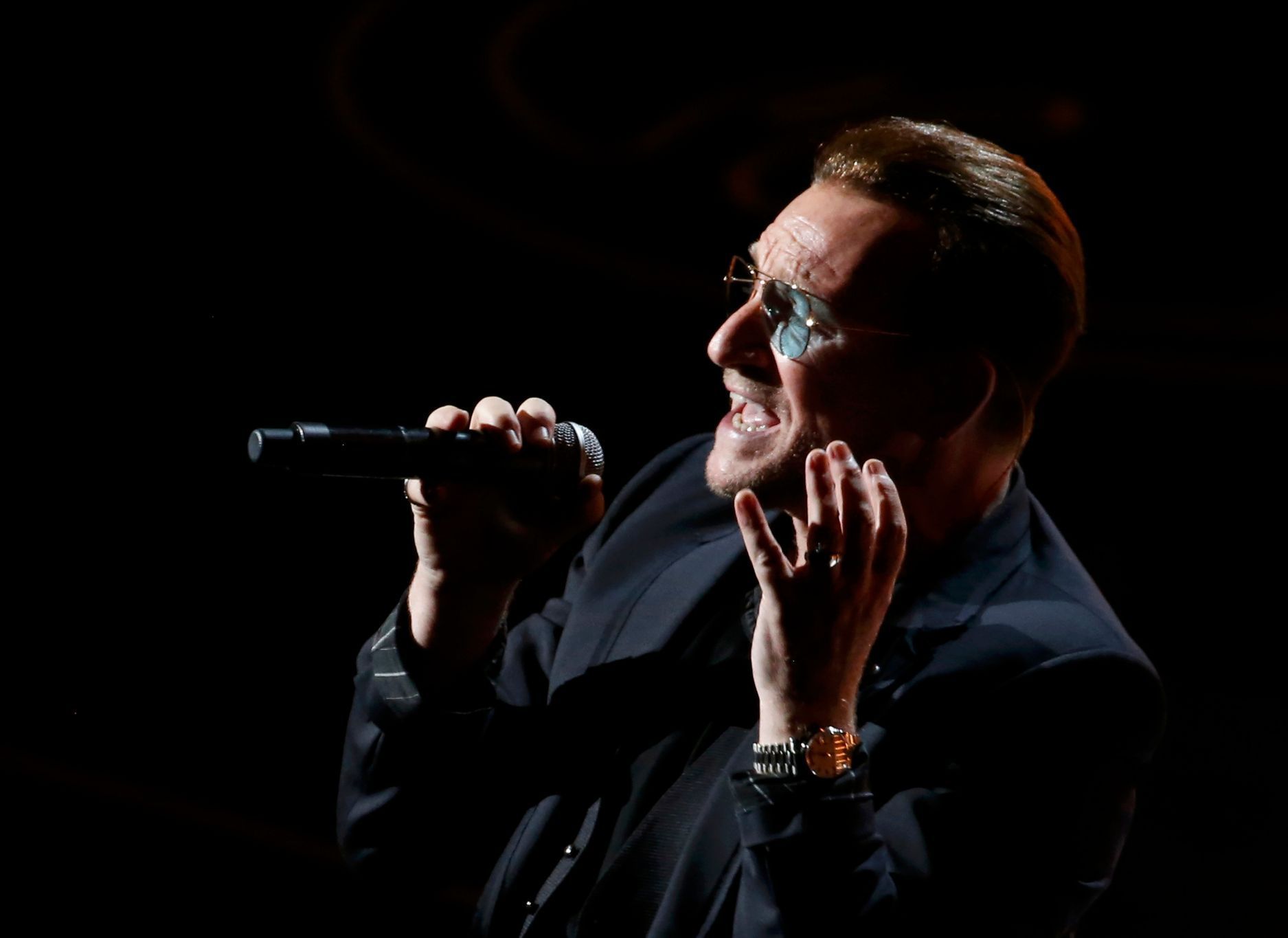 Lead singer Bono of the Irish rock band U2 performs &quot;Ordinary Love&quot; from the film &quot;Mandela: Long Walk to Freedom&quot; at the 86th Academy Awards in Hollywood