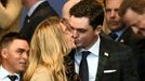 U.S. Team player Keegan Bradley kisses his partner Jillian Stacey during the opening ceremony of the 40th Ryder Cup at Gleneagles