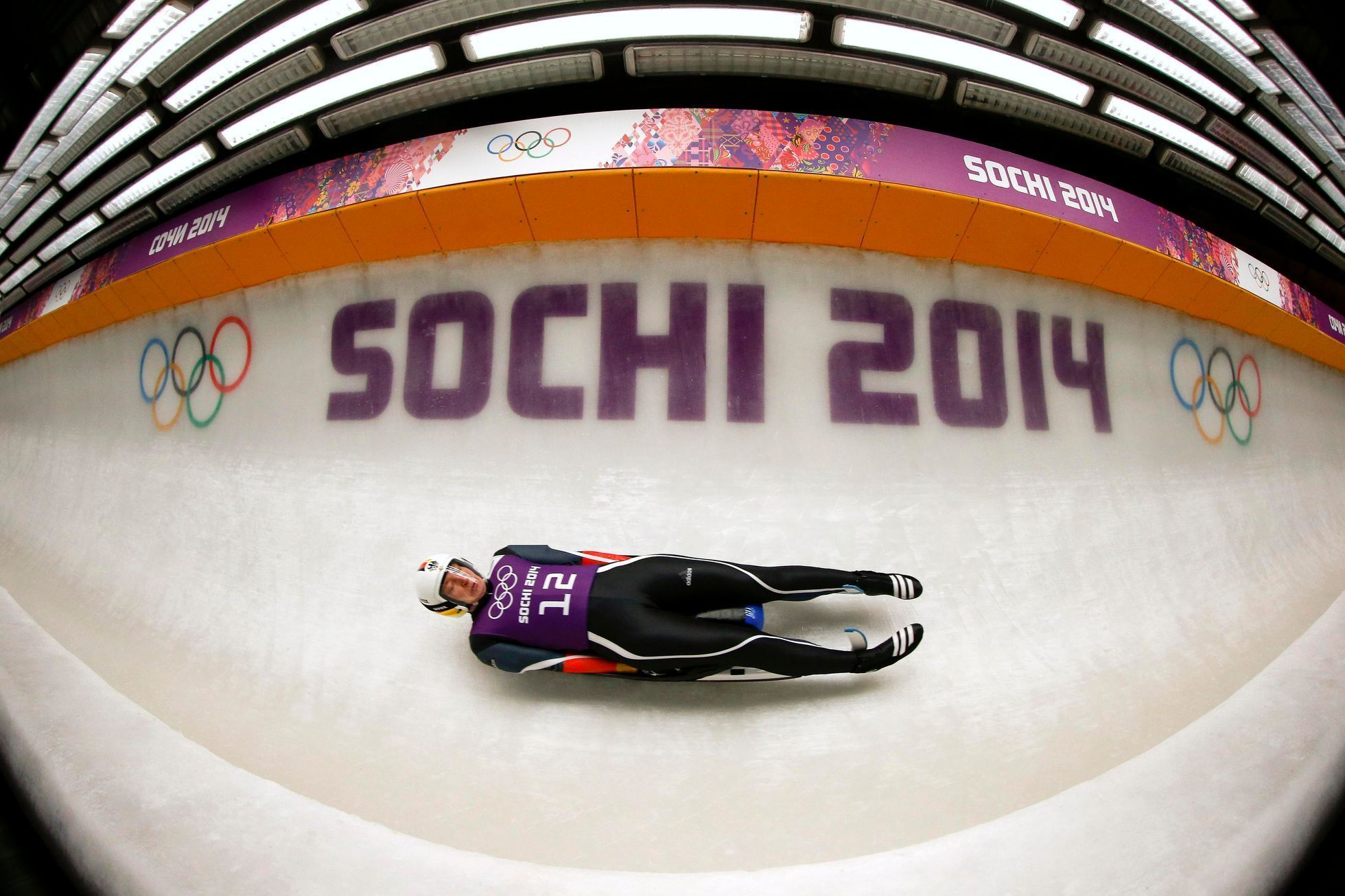 Germany's Huefner speeds down the track during the women's luge training at the Sanki sliding center in Rosa Khutor near Sochi