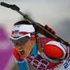 Czech Republic's Vitkova reacts after crossing finish line in women's biathlon 15km individual event at 2014 Sochi Winter Olympics