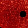 NASA's TRACE satellite captured this image of Venus crossing the face of the sun as seen from Earth orbit. Credit: NASA