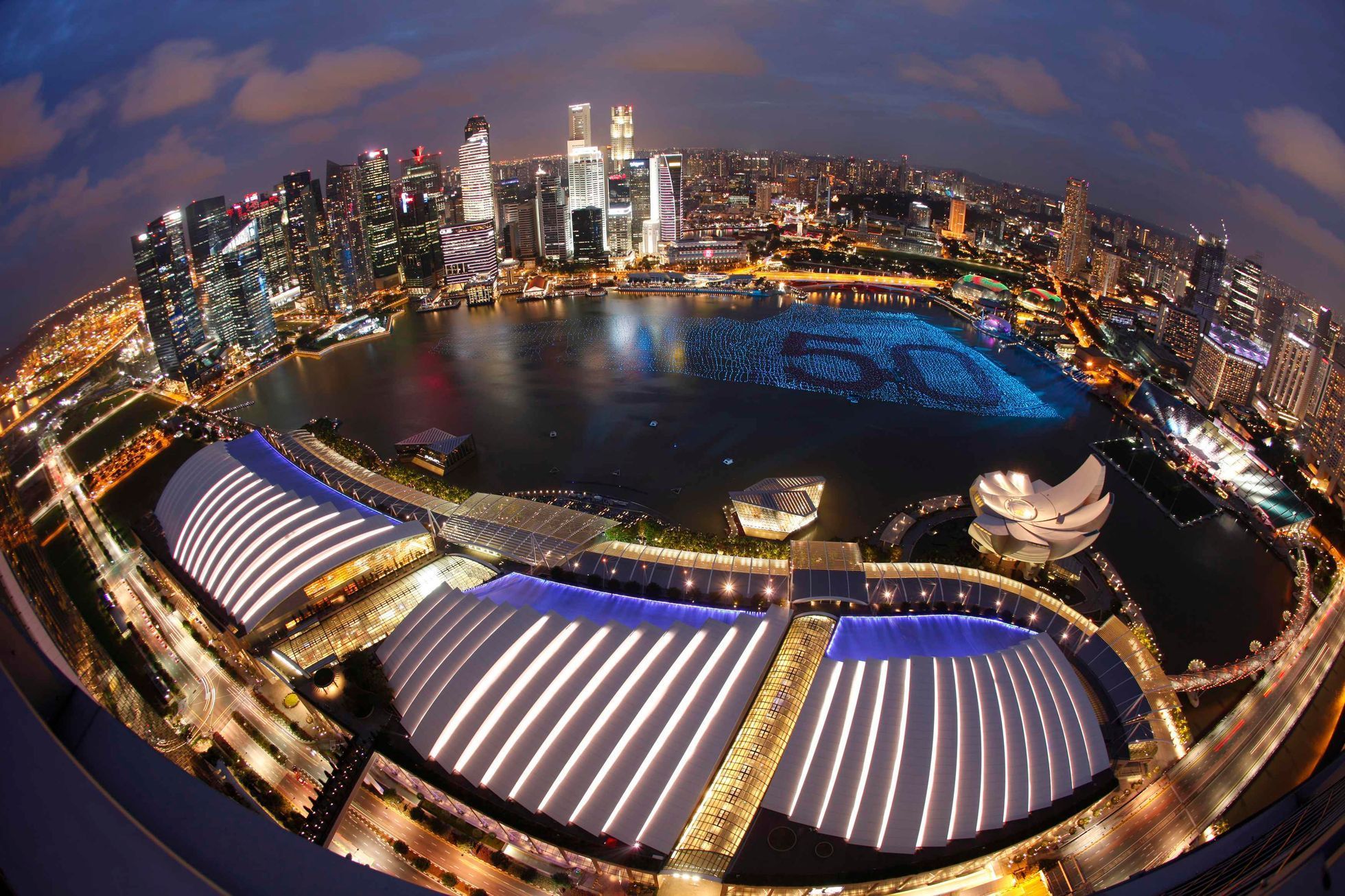 A floating installation of 25,000 wishing spheres line Marina Bay as the city's financial district is seen in the background, ahead of the New Year's Day countdown celebrations, in Singapore