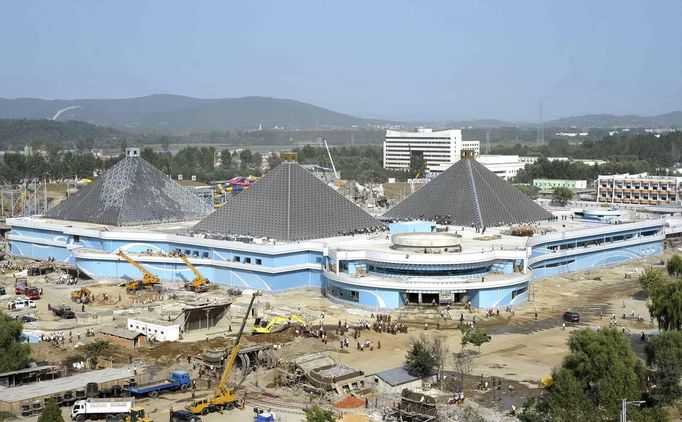 Construction labourers carry out work at the site of the Munsu Swimming Complex in North Korea