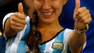 An Argentina supporter poses for a picture before the 2014 World Cup Group F soccer match between Argentina and Bosnia and Herzegovina at the Maracana stadium in Rio de J