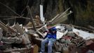 Saul Gabarri Valdes, 7, cries amidst the remains of his home after it was demolished at the Spanish gypsy settlement of Puerta de Hierro, in the outskirts of Madrid November 20, 2012. Fifty-four families have been living in Puerta de Hierro, on the banks of the Manzanares river for over 50 years. Since the summer of 2010, the community has been subject to evictions on the grounds that the dwellings are illegal. Families, whose homes have been demolished, move in with relatives whose houses still remain while the debris keeps piling up around them as more demolitions take place. REUTERS/Susana Vera (SPAIN - Tags: BUSINESS CONSTRUCTION CIVIL UNREST TPX IMAGES OF THE DAY) Published: Lis. 20, 2012, 4:39 odp.