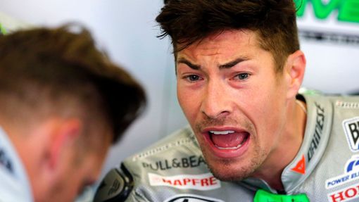 Honda MotoGP rider Nicky Hayden of the U.S. reacts in his garage during the third free practice session of the French Grand Prix in Le Mans circuit, May 17, 2014. REUTERS