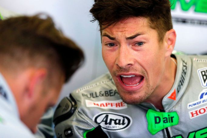 Honda MotoGP rider Nicky Hayden of the U.S. reacts in his garage during the third free practice session of the French Grand Prix in Le Mans circuit, May 17, 2014. REUTERS