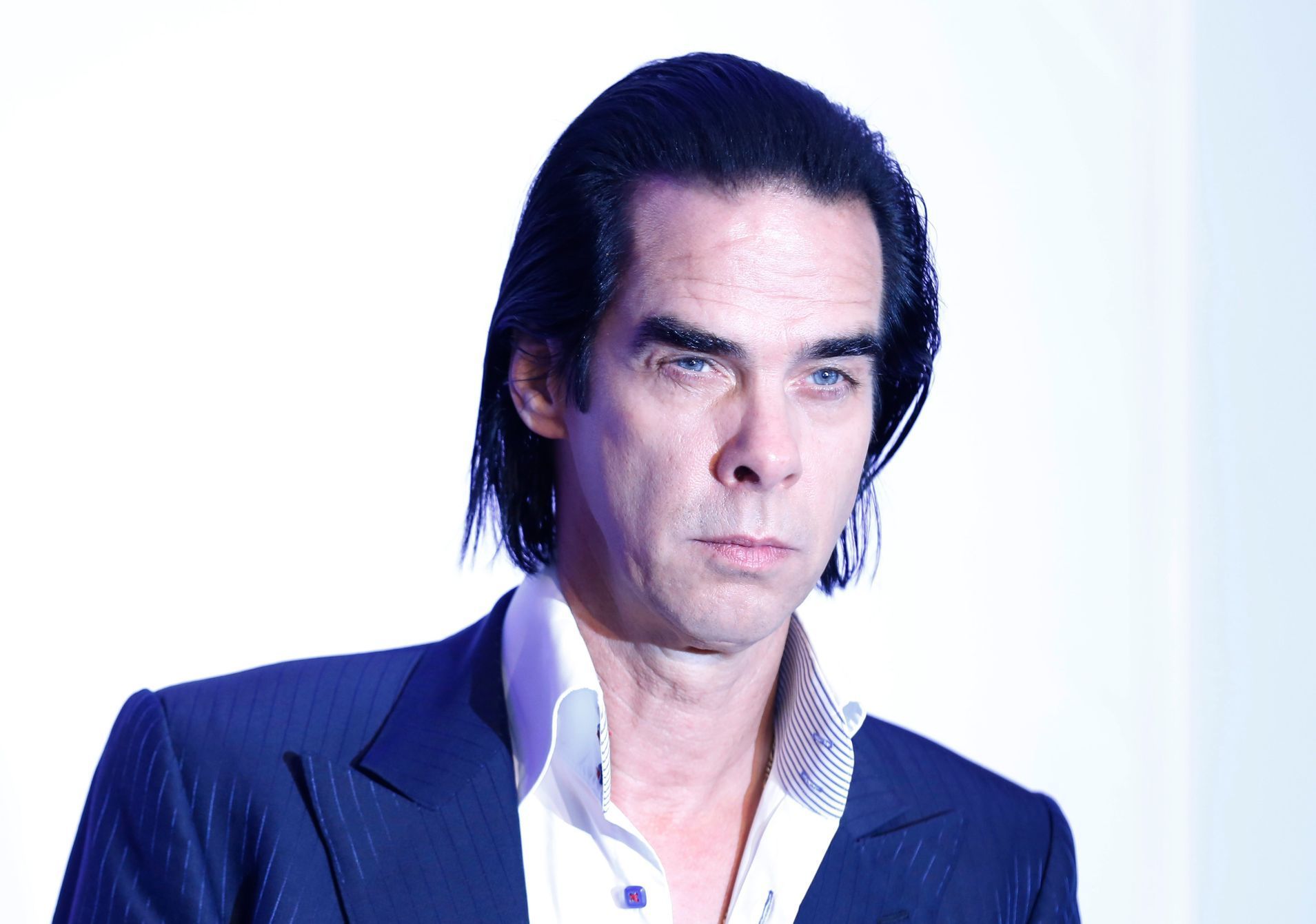 Singer Nick Cave arrives for a gala screening of '20,000 Days on Earth' at the Barbican in London