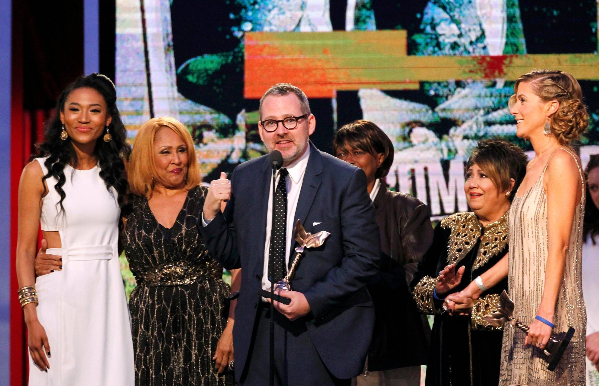 Director Morgan Neville with the cast of &quot;20 Feet from Stardom&quot; accepts the best documentary award at the 2014 Film Independent Spirit Awards in Santa Monica