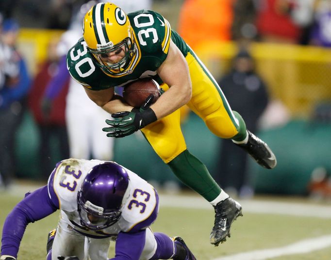 NFL,  John Kuhn (Green Bay Packers) - 30 a Jamarca Sanford (Minnesota Vikings)