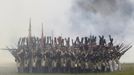 Participants in period costume re-enact the battle of Borodino during anniversary celebrations at the Borodino museum-reserve outside Moscow September 2, 2012. Russian President Vladimir Putin made a rousing call for unity among Russia's diverse ethnic and religious groups on Sunday as he led commemorations of a battle 200 years ago that led to the defeat of Napoleon Bonaparte. REUTERS/Sergei Karpukhin (RUSSIA - Tags: ANNIVERSARY POLITICS CONFLICT TPX IMAGES OF THE DAY) Published: Zář. 2, 2012, 7:29 odp.