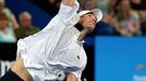 John Isner of the U.S. serves to Fabio Fognini of Italy during their men's singles tennis match at the 2015 Hopman Cup in Perth