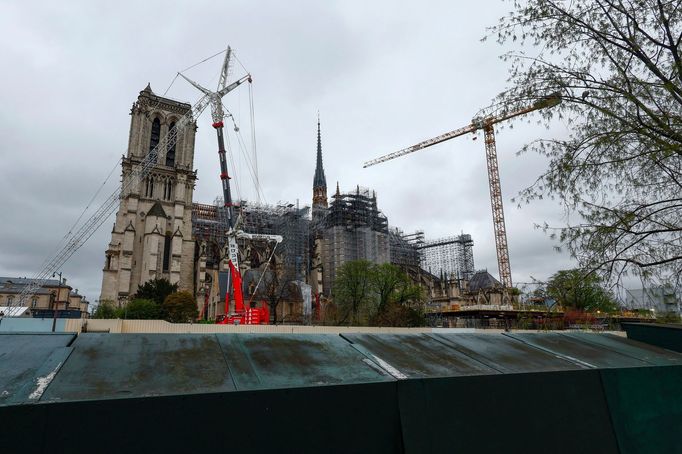 A general view shows the Notre-Dame de Paris Cathedral, which was ravaged by a fire in 2019, with a new spire, surmounted by the rooster and the cross, as restoration wor