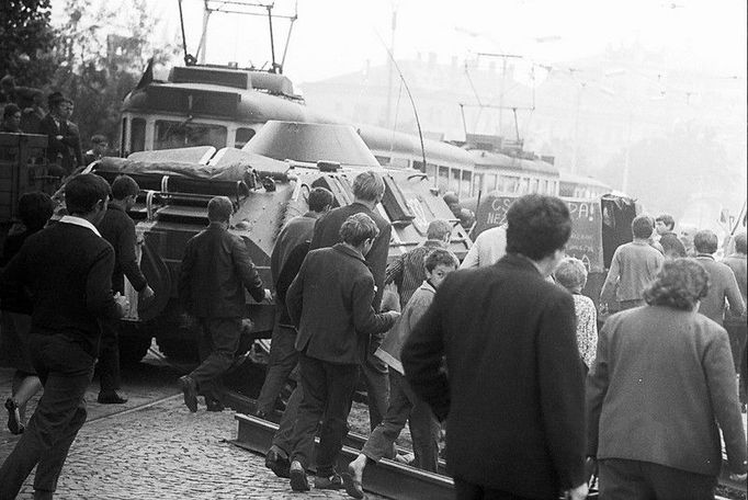 As a Czech soldier tried to block the way of Soviet army vehicles with his military car, the Soviets hesitated for a while, not knowing what to do. "Then they accelerated the speed and just pushed the Czech soldier´s car aside. I believe a few shots were fired. But at that moment, I wasted no time and ran away as everyone else did," photographer Gregor remembers.