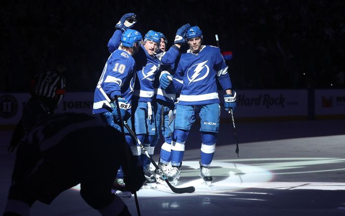 Mar 18, 2019; Tampa, FL, USA; Tampa Bay Lightning center Steven Stamkos (91) is congratulated by center J.T. Miller (10) and defenseman Erik Cernak (81) after scoring  du