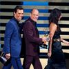 Presenters McConaughey and Harrelson walk offstage with the award for Outstanding Lead Actor In A Miniseries Or A Movie for Benedict Cumberbatch for his role in &quot;Sherlock: His Last Vow&quot; onst