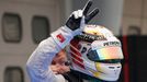 Mercedes Formula One driver Lewis Hamilton of Britain gestures after the qualifying session for the Malaysian F1 Grand Prix at Sepang International Circuit outside Kuala