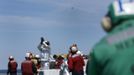 Crewmembers react as an X-47B pilot-less drone combat aircraft is launched for the first time off an aircraft carrier, the USS George H. W. Bush, in the Atlantic Ocean off the coast of Virginia, May 14, 2013. The U.S. Navy made aviation history on Tuesday by catapulting an unmanned jet off an aircraft carrier for the first time, testing a long-range, stealthy, bat-winged plane that represents a jump forward in drone technology. REUTERS/Jason Reed (UNITED STATES - Tags: MILITARY SCIENCE TECHNOLOGY) Published: Kvě. 14, 2013, 6:39 odp.