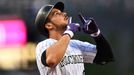 Jun 28, 2019; Denver, CO, USA; Colorado Rockies third baseman Nolan Arenado (28) celebrates after hitting a two run home run against the Los Angeles Dodgers in the first