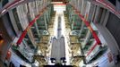 The Shenzhou-9 manned spacecraft, Long March-2F rocket, and escape tower wait to be transferred to the launch pad at the Jiuquan Satellite Launch Center, Gansu province June 9, 2012. China will launch its Shenzhou-9 manned spacecraft sometime in mid-June to perform the country's first manned space docking mission with the orbiting Tiangong-1 space lab module, a spokesperson with the country's manned space program said here Saturday, Xinhua News Agency reported. REUTERS/China Daily (CHINA - Tags: SCIENCE TECHNOLOGY TPX IMAGES OF THE DAY) CHINA OUT. NO COMMERCIAL OR EDITORIAL SALES IN CHINA Published: Čer. 9, 2012, 12:31 odp.