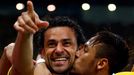 Brazil's Fred celebrates with teammate Neymar after scoring