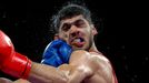 Paris 2024 Olympics - Boxing - Men's 63.5kg - Prelims - Round of 16 - North Paris Arena, Villepinte, France - July 29, 2024. Erislandy Alvarez of Cuba in action against J