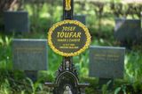 Z iniciativy publicisty Miloše Doležala byl v roce 2014 na Ďáblickém hřbitově objeven hrob komunisty umučeného pátera Josefa Toufara. Na identifikaci Toufarových ostatků se podíleli archeologové s forenzními genetiky.
