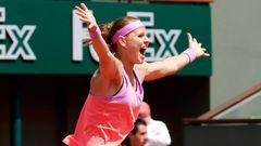 Lucie Safarova of Czech Republic celebrates after winning with Mattek-Sands of the US their women's doubles final match against Dellacqua of Australia and Shvedova of Kazakhstanat the French Open tenn