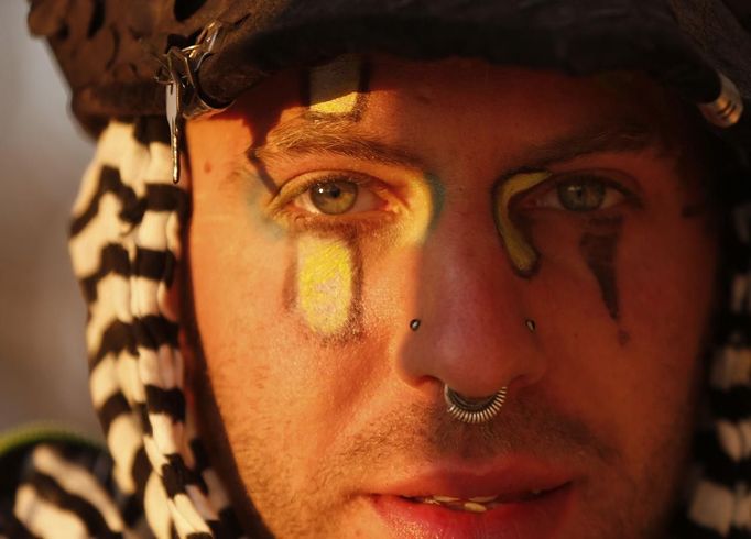 Ocram", his playa name, at sunrise during the Burning Man 2012 "Fertility 2.0" arts and music festival in the Black Rock Desert of Nevada, August 29, 2012. More than 60,000 people from all over the world have gathered at the sold out festival, which is celebrating its 26th year, to spend a week in the remote desert cut off from much of the outside world to experience art, music and the unique community that develops.