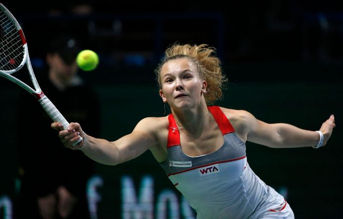 Czech Republic's Katerina Siniakova hits a return against Russia's Anastasia Pavlyuchenkova during their Kremlin Cup semi-finals tennis match in Moscow October 18, 2014.