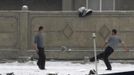 North Korean soldiers play football at a playground along the banks of Yalu River near the North Korean town of Sinuiju, opposite the Chinese border city of Dandong, February 12, 2013. North Korea conducted its third-ever nuclear test on Tuesday, a move likely to anger its main ally China and increase international action against Pyongyang and its new young leader, Kim Jong-un. REUTERS/Stringer (CHINA - Tags: POLITICS MILITARY) Published: Úno. 12, 2013, 7 dop.