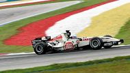 Jenson Button s Hondou na trati Velké ceny Malajsie.