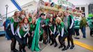 Jan 1, 2020; Dallas, Texas, USA; The Dallas Stars ice girls and Stars super fan Matthew Day pose for a photo before the 2020 Winter Classic hockey game at the Cotton Bowl