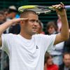 Mikhail Youzhny of Russia reacts after defeating Robin Haase