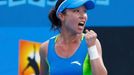 Zheng Jie of China celebrates a point during her women's singles match against Madison Keys of the United States at the Australian Open 2014 tennis tournament in Melbourn