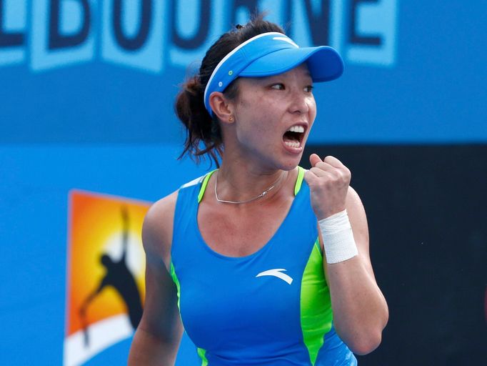 Zheng Jie of China celebrates a point during her women's singles match against Madison Keys of the United States at the Australian Open 2014 tennis tournament in Melbourn