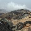 Hořící skládka pneumatik v Tušimicích