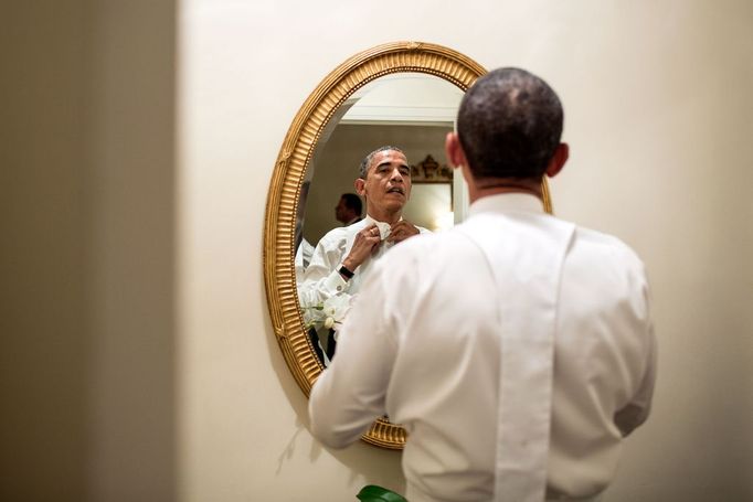 Oct. 18, 2012 "The President ties his white tie before the Alfred E. Smith dinner in New York. Although the dinner is an annual event, every four years, the two presidential nominees attend the dinner only a few weeks before the election."