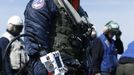 Northrop Grumman test pilot Dave Lorenz is pictured with an arm-mounted controller before successfully launching an X-47B pilot-less drone combat aircraft for the first time off an aircraft carrier, the USS George H. W. Bush, in the Atlantic Ocean off the coast of Virginia, May 14, 2013. The U.S. Navy made aviation history on Tuesday by catapulting an unmanned jet off an aircraft carrier for the first time, testing a long-range, stealthy, bat-winged plane that represents a jump forward in drone technology. REUTERS/Jason Reed (UNITED STATES - Tags: MILITARY SCIENCE TECHNOLOGY) Published: Kvě. 14, 2013, 7:12 odp.