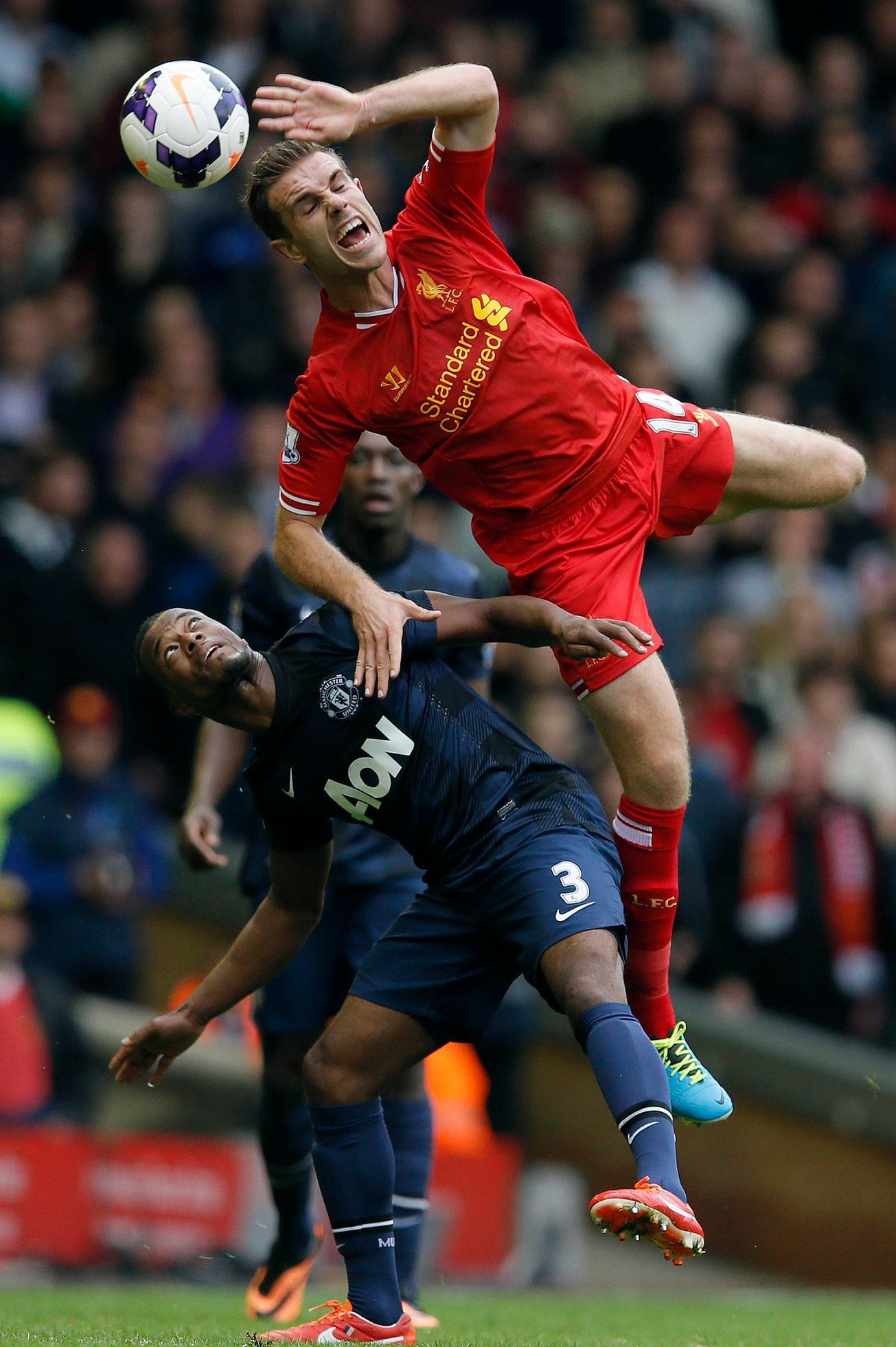 Handerson a Evra v utkání Liverpool - United