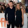 Aniston arrives with Worthington for the &quot;Cake  at the Toronto International Film Festival in Toronto