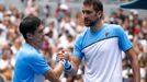 Tennis - Australian Open - Second Round - Melbourne Park, Melbourne, Australia, January 16, 2019. Croatia's Marin Cilic shakes hands with Mackenzie McDonald of the U.S. a