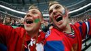 Two supporters of Russia cheer their team during the first period of their men's ice hockey World Championship Group B game against Belarus at Minsk Arena in Minsk May 20