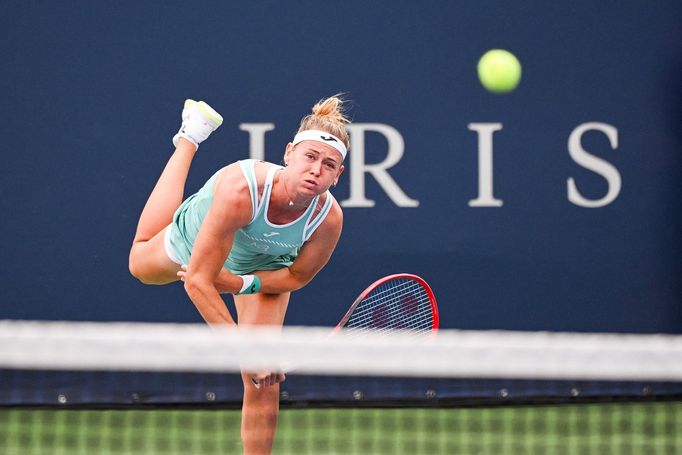 Aug 7, 2023; Montreal, Quebec, Canada; Marie Bouzkova (CZE) serves the ball against Kayla Day (USA) (not pictured) during first round play at IGA Stadium. Mandatory Credi