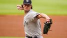 Aug 26, 2020; Cumberland, Georgia, USA; New York Yankees starting pitcher Gerrit Cole (45) pitches against the Atlanta Braves during the first inning at Truist Park. Mand