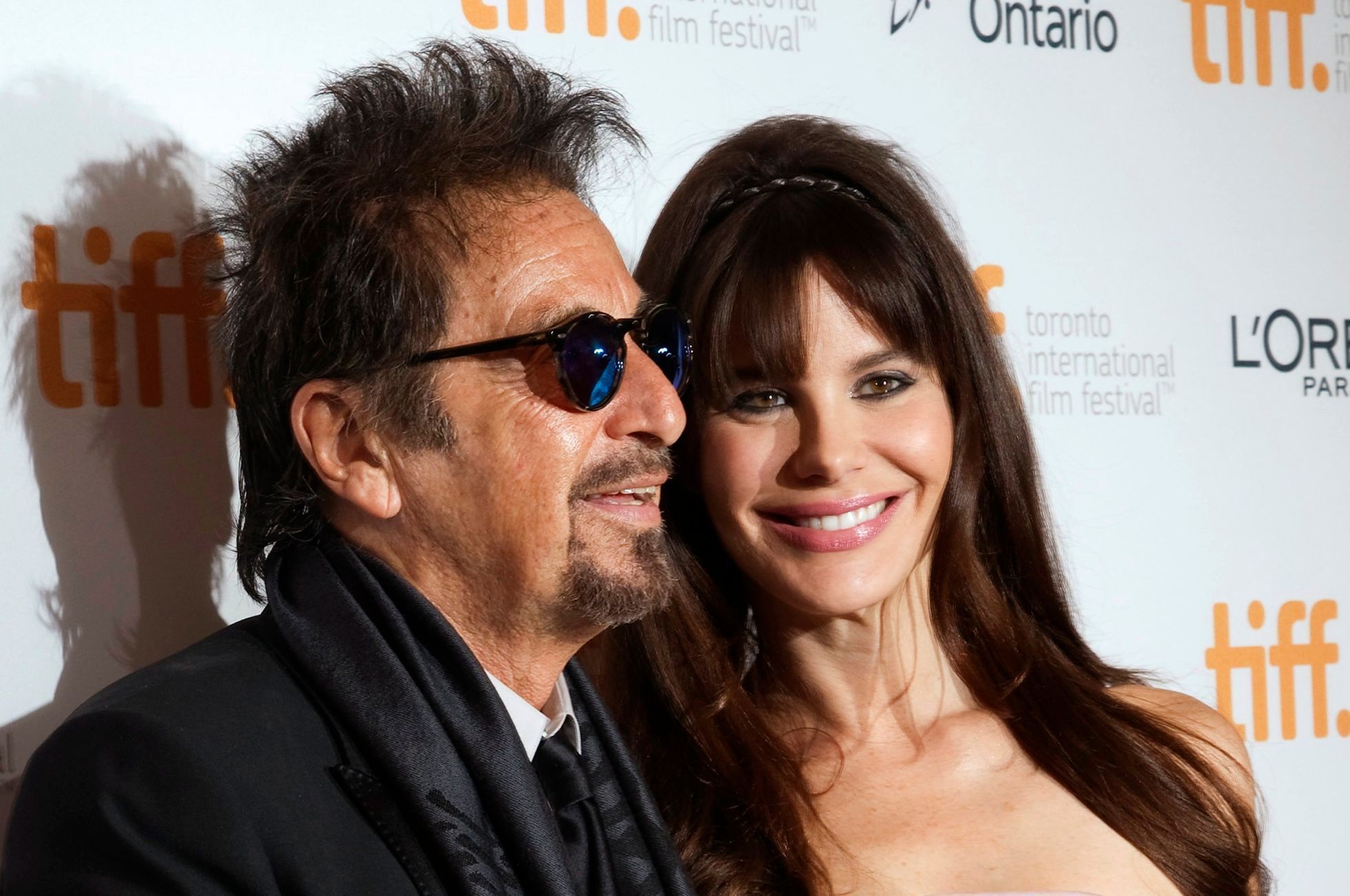 Actor Al Pacino and his girlfriend Lucila Sola pose as they arrive for
