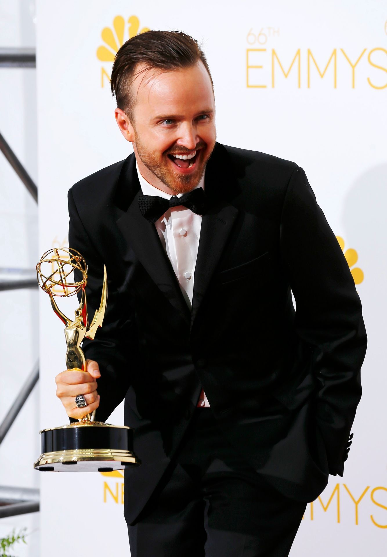 Aaron Paul poses with his Outstanding Supporting Actor in a Drama Series for AMC's &quot;Breaking Bad&quot; at the 66th Primetime Emmy Awards in Los Angeles