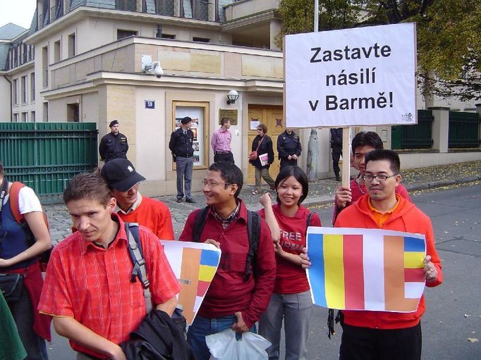 Stop the violence in Burma! Members of the tiny Burmese minority in Prague carrying the banners and Buddhist religious flags, which rapidly became the new symbol of pro-democracy struggle after the monks joined the protests in Burma and turned them into real mass events. For a while, anyway.