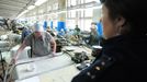 Ivanovo Region prison colony for convicted women Ivanovo Region prison colony for convicted women IVANOVO REGION, RUSSIA. APRIL 25, 2012. A prison guard supervises convicted women in the sewing room at Women's Prison Colony No3 of the Ivanovo Region branch of the Russian Federal Service of Execution of Sentences (UFSIN) pose for photographs during a fashion show.