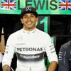 Mercedes Formula One driver Lewis Hamilton of Britain poses for pictures after winning the Bahrain F1 Grand Prix at the Bahrain International Circuit (BIC) in Sakhir